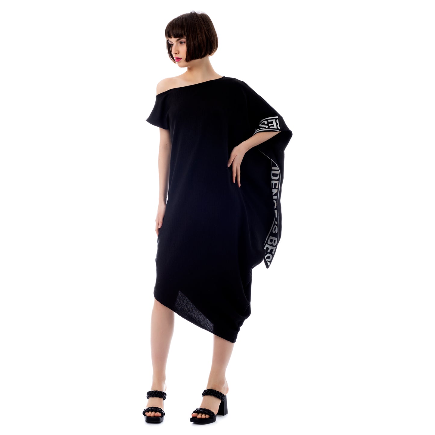 Sleek Signature: Seva's Logo-Adorned Asymmetric Black ss.24.se.116