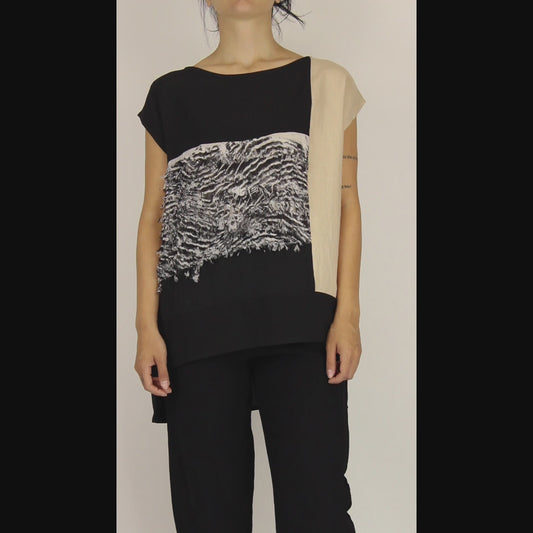 SS.132.TUNIC