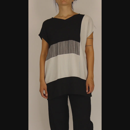 SS.154.TUNIC